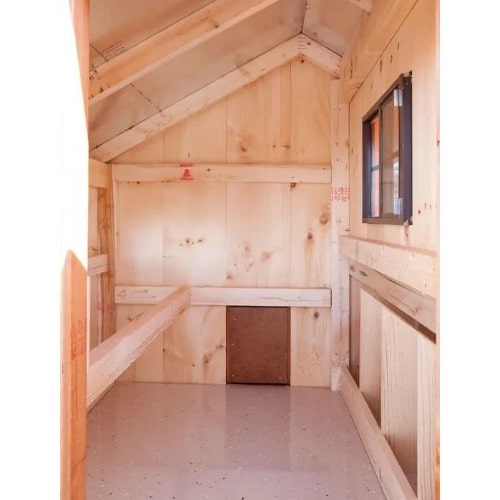 Portable_Hen_House_on_Wheels_interior_view_with_nesting_boxes_and_attached_roosts